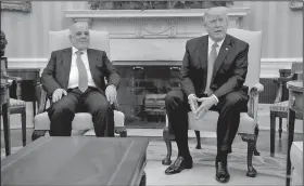  ?? AP/EVAN VUCCI ?? President Donald Trump meets with Iraqi Prime Minister Haider al-Abadi on Monday in the Oval Office of the White House in Washington.