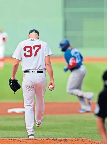  ?? Stuart CaHill pHotos / Herald staff ?? LONG DAY: Starting pitcher Nick Pivetta kicks the dirt as Blue Jays designated hitter Vladimir Guerrero Jr. rounds the bases on his two-run homer in the first inning at Fenway Park on Saturday. Below, catcher Christian Vazquez tosses his helmet in frustratio­n after making the final out of the eighth.