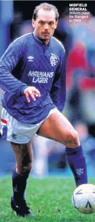  ??  ?? MIDFIELD GENERAL Wilkins plays for Rangers in 1989