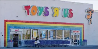  ?? Buy this photo at YumaSun.com PHOTO BY RANDY HOEFT/YUMA SUN ?? A SHOPPER LEAVES TOYS R US, 801 W. 32ND ST., WEDNESDAY MORNING. The Yuma store is reportedly one of 182 stores, including five others in Arizona, that the chain plans to close as part of its Chapter 11 bankruptcy reorganiza­tion plan.