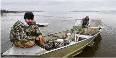  ??  ?? Feeling the heat: Hunters preparing to search for geese and ducks in Napakiak, Alaska. — AFP