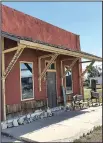  ?? The Wichita Eagle/TNS/MATT RIEDL ?? The owner of Cousin Eddie’s Visitor Center in Coolidge, Kan., hopes to turn the antiques shop into a
attraction.