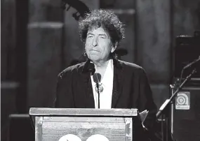  ?? ASSOCIATED PRESS FILE PHOTO ?? Bob Dylan accepts top honors at the 2015 MusiCares Person of the Year show in Los Angeles.