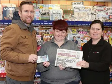  ??  ?? At Steemers/O’Leary’s Newsagent, Bunclody were PJ Banville, advertisin­g executive, Enniscorth­y Guardian; Liz Kelly, Bunclody, winner €20 and Marie Byrne, store manager.