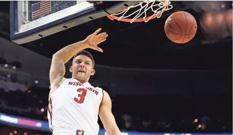  ?? ASSOCIATED PRESS ?? Wisconsin senior guard Zak Showalter has become a key contributo­r for the Badgers after deciding to redshirt the 2013-’14 season.