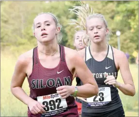  ?? Bud Sullins/Special to the Herald-Leader ?? Macie Herrel runs during the Panther Cross Country Classic on Saturday.