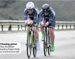  ??  ?? Chasing game Alex McAllister leading Robert Kelly in a recent time trial