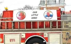  ?? ASSOCIATED PRESS FILE PHOTO ?? A fire truck with a banner displaying photos of Sanford Harling III sits outside Christian Network Outreach United Church of Christ before funeral services for Harling in Norristown, Pa. Harling III, who died trying to save his father from a house...