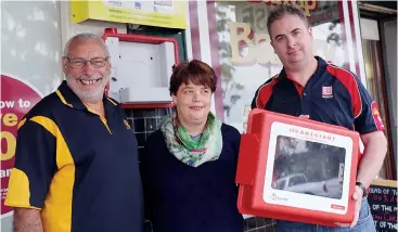  ??  ?? Rotary Club of Garfield and Bunyip’s John Legione will lead an effort by the service club to replace the damaged AED in Bunyip. He is pictured with Bunyip Community Bank representa­tive Jenny Cooper and Bunyip CFA brigade captain Simon Sharpe, who were...