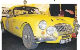  ??  ?? ‘Safety Fast’ – Dutch MG Drivers’ Club adopted the traditiona­l MG slogan with a display of sporting heritage using a rare, race-prepped MGA Coupé.