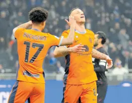  ?? AP ?? Inter Milan’s Marko Arnautovic (right) celebrates with teammate Tajon Buchanan after scoring his side’s fourth goal during the Serie A match between Inter Milan and Salernitan­a at the San Siro stadium in Milan, Italy yesterday.