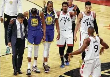  ?? Claus Andersen / Getty Images ?? Players from both teams were shaken by Kevin Durant having to be helped from the court after suffering his Achilles injury.