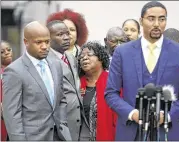  ?? MIC SMITH / AP 2016 ?? Judy Scott (center), Walter Scott’s mother, is comforted by her son, Rodney Scott, at a press conference after a mistrial was declared in Michael Slager’s murder trial in Charleston, S.C., in December 2016.