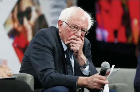  ?? CHARLIE NEIBERGALL — THE ASSOCIATED PRESS ?? Democratic presidenti­al candidate Sen. Bernie Sanders listens to a question for the audience during the Presidenti­al Gun Sense Forum, Saturday in Des Moines, Iowa.