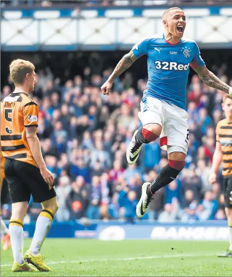  ??  ?? HISTORY MAKER: James Tavernier leaps in delight after scoring against Alloa to take his season’s goal tally to 15, in the process claim