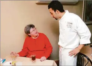  ?? Chris Ware / Chris Ware ?? From left, Anne Trenck, of Brookfield, chats with Italianos restaurant owner Sam Abdelkader in Brookfield on March 30, 2010.