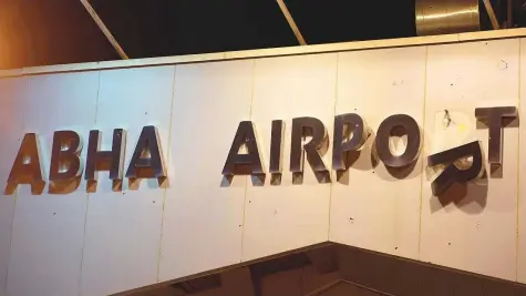  ?? Reuters ?? ■ A damaged sign is seen at Abha Internatio­nal Airport after a drone attack by Houthi group on August 31. Eight people were wounded in the attack, which also damaged a civilian plane.