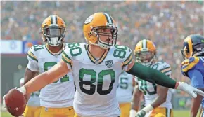  ?? JIM MATTHEWS/USA TODAY NETWORK-WIS ?? Packers tight end Jimmy Graham (80) reacts after making a catch near the goal line against the Rams on Sunday.