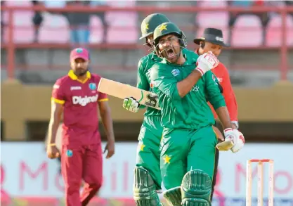  ??  ?? PROVIDENCE: Sarfraz Ahmed of Pakistan celebrates winning the 3rd and final ODI match between West Indies and Pakistan at Guyana National Stadium, Providence, Guyana, on Tuesday. — AFP