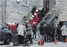  ?? DAVID BEBEE WATERLOO REGION RECORD FILE PHOTO ?? Crews get ready to shoot a scene of the Handmaid's Tale outside Cambridge City Hall in 2018. The city had 15 projects in the works to film in the city during the spring and summer before the COVID-19 pandemic.