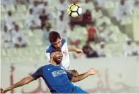  ?? Photo by Shihab ?? Joan Oumari of Al Nasr and Ryan James of Sharjah in action during the Arabian Gulf League. —