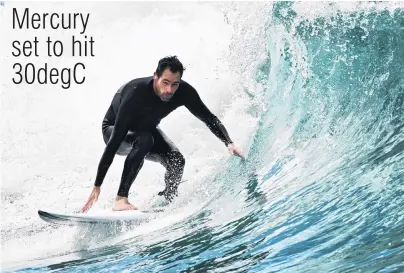  ?? PHOTO: GERARD O’BRIEN ?? Surf’s up . . . Will Lewis, of Dunedin, enjoys surfing at St Clair Beach yesterday.