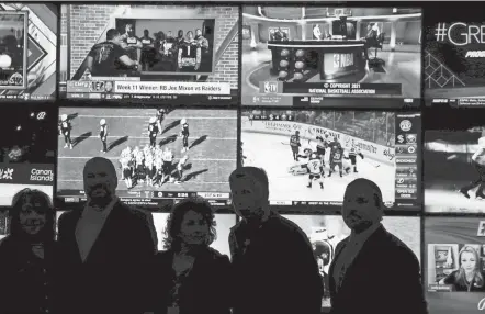  ?? SARAH KLOEPPING/USA TODAY NETWORK ?? People stand in front of a wall of television­s showing a variety of sports at a Wisconsin casino. Ohio could become the next state to legalize sports gambling.
Rep. Adam Miller