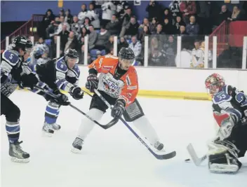  ??  ?? Maris Ziedins scores the first of his two goals in Phantoms’ victory over Sheffield last Sunday.