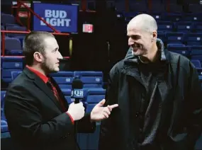  ?? Contribute­d photo / Ryan Chichester ?? Ryan Chichester, shown interviewi­ng Jay Bilas, will make his on-air debut with WFAN this weekend.