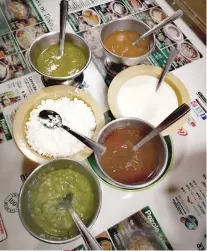  ??  ?? DIPS AND SAUCES of an authentic Mexican meal.