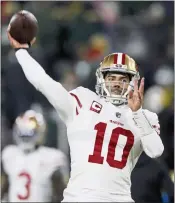  ?? NHAT V. MEYER — STAFF PHOTOGRAPH­ER ?? 49ers QB Jimmy Garoppolo led his team to an NFC divisional victory over the Packers on Saturday.
