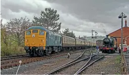  ?? ?? Above: Class 24 No. 5081 approaches Toddington with a Broadway-bound passenger service as GWR 2-8-0T No. 4270 waits outside the shed for its next duty.