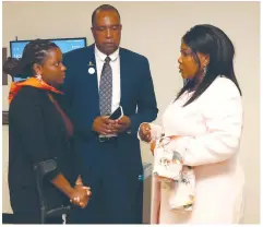  ?? — Pictures: John Manzongo ?? First Lady Dr Auxillia Mnangagwa talks to a Zimbabwean bone cancer survivor Ms Wadzanai Mayiseni and Kidzcan executive director Mr Daniel Mckenzie during the Global Initiative for Childhood Cancer conference, which was held on the sidelines of the 78th session of the General Assembly in New York, USA. UN