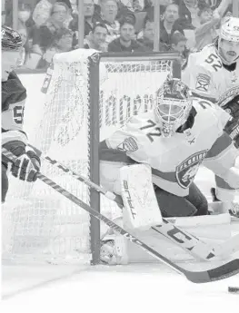  ?? GENE J. PUSKAR/AP ?? Pittsburgh’s Jake Guentzel gets off a pass in front of Panthers goaltender Sergei Bobrovsky during Thursday night’s game.