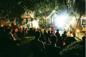  ??  ?? The audience listens attentivel­y to a poet at the Malam Sayu Berpuisi outdoor poetry event at KLPac last month.