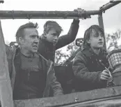  ?? Nicolas Cage, from left, Maxwell Jenkins and Jaeden Martell star in “Arcadian.” PROVIDED BY RLJE FILMS ??