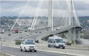  ?? RIC ERNST/PNG FILES ?? A driver going the wrong way on Highway 1 managed to cross the Port Mann Bridge before being stopped by police.