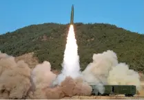  ?? KOREAN CENTRAL NEWS AGENCY PHOTO VIA XINHUA ?? TO INFINITY AND BEYOND
This Jan. 14, 2022 file handout photo shows a tactical guided missile launched during a firing drill in North Phyongan province in western North Korea.