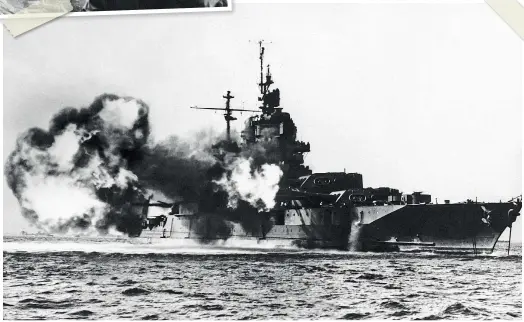  ??  ?? BELOW An American battleship fires at Okinawa, the largest of the Ryukyu Islands. May 18, 1945