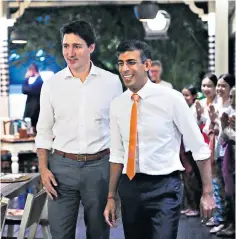  ?? ?? Prime ministers Justin Trudeau and Rishi Sunak at the Art Cafe Bumbu Bali, Indonesia