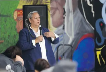  ?? MICHELLE BERG ?? Raven Sinclair talks about the ’60s Scoop during the opening day of a three-day conference called Revitalizi­ng From Our Grieving Spirit at the Saskatoon Indian and Metis Friendship Centre on Tuesday.