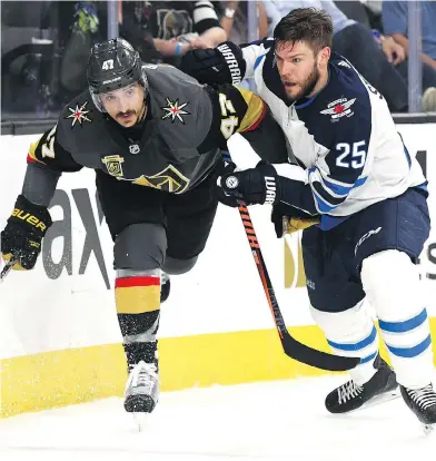  ?? HARRY HOW / GETTY IMAGES ?? Centre Paul Stastny, right, had six goals and 15 points in 17 playoff games this year for the Jets.