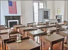  ??  ?? Replica desks evoke the first session of the Arkansas House of Representa­tives in 1836.
