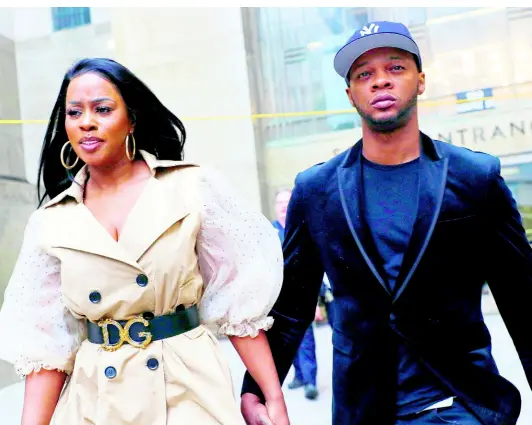  ?? AP ?? Rapper Remy Ma leaves the Manhattan Criminal Court with her husband, Papoose.