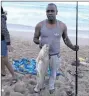  ??  ?? Alvin Govender caught this salmon at Isipingo Beach using
mackerel bait. If you caught a big fish, then e-mail a goodqualit­y picture, together with your details, to postsport@inl. co.za