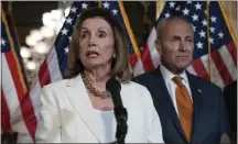 ?? J. SCOTT APPLEWHITE — THE ASSOCIATED PRESS ?? Speaker of the House Nancy Pelosi, D-Calif., joined at right by Senate Minority Leader Chuck Schumer, D-N.Y., calls for a Senate vote on the House-passed Bipartisan Background Checks Act.