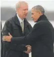  ?? | MANDEL NGAN/AFP/
GETTY IMAGES ?? Gov. Bruce Rauner greets President Barack Obama in Springfiel­d onWednesda­y.