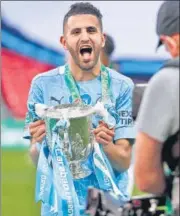  ??  ?? Man City’s Riyad Mahrez celebrates winning the League Cup.