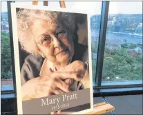  ?? THE CANADIAN PRESS/HO-TIM GREENE -THE ROOMS ?? A poster of the late artist Mary Pratt is shown at a memorial in St.john’s on Saturday. Friends, family and admirers recalled Pratt fondly at The Rooms, an art gallery and museum overlookin­g the St. John’s Harbour, as they paid tribute to the esteemed painter’s life on Saturday night.
