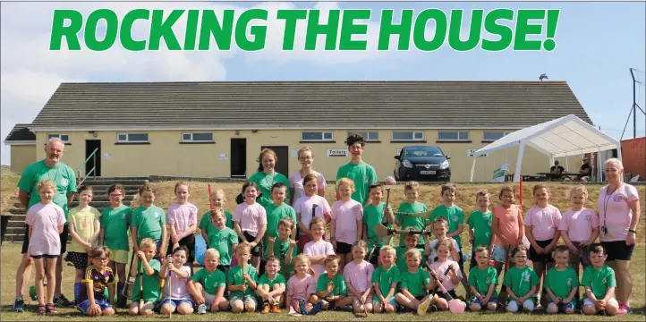  ??  ?? HAPPY DAYS: A large group of young Arklow Rock hurlers with their coaches at the camp last week.